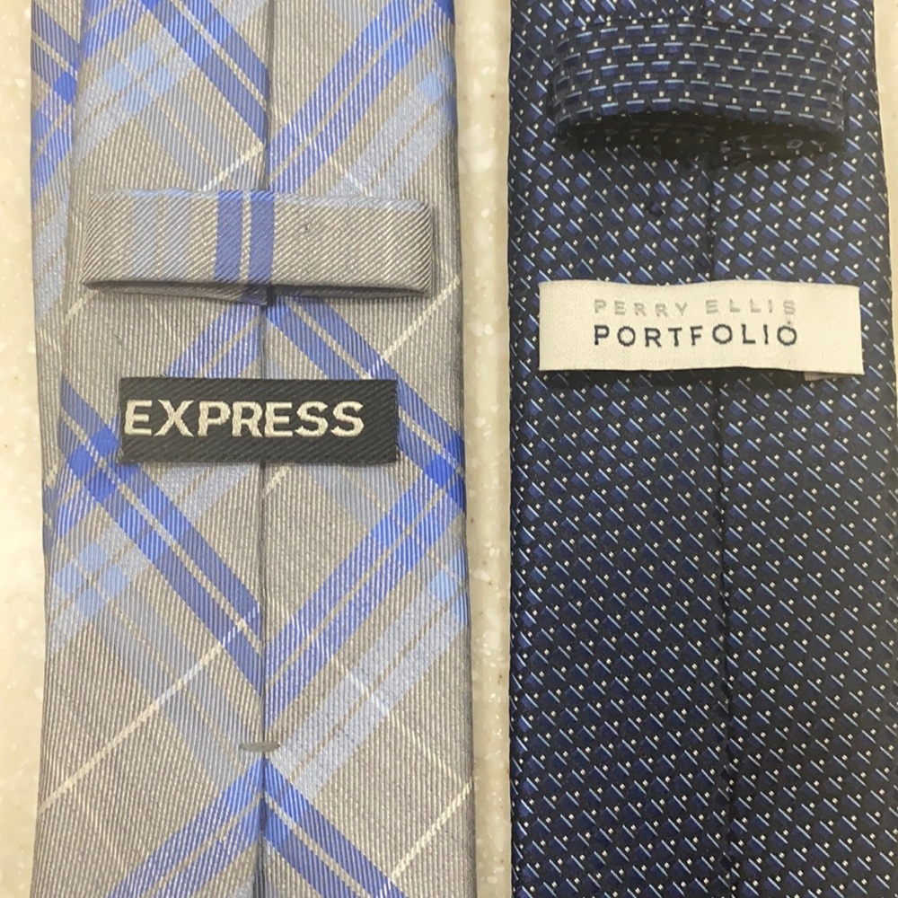 Selling two silk, skinny ties for men.